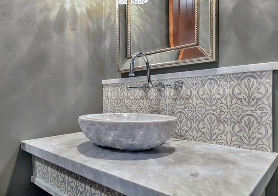 Timeless Decorative Bathroom Backsplash in Devonshire Collection featured on Carrara White Marble